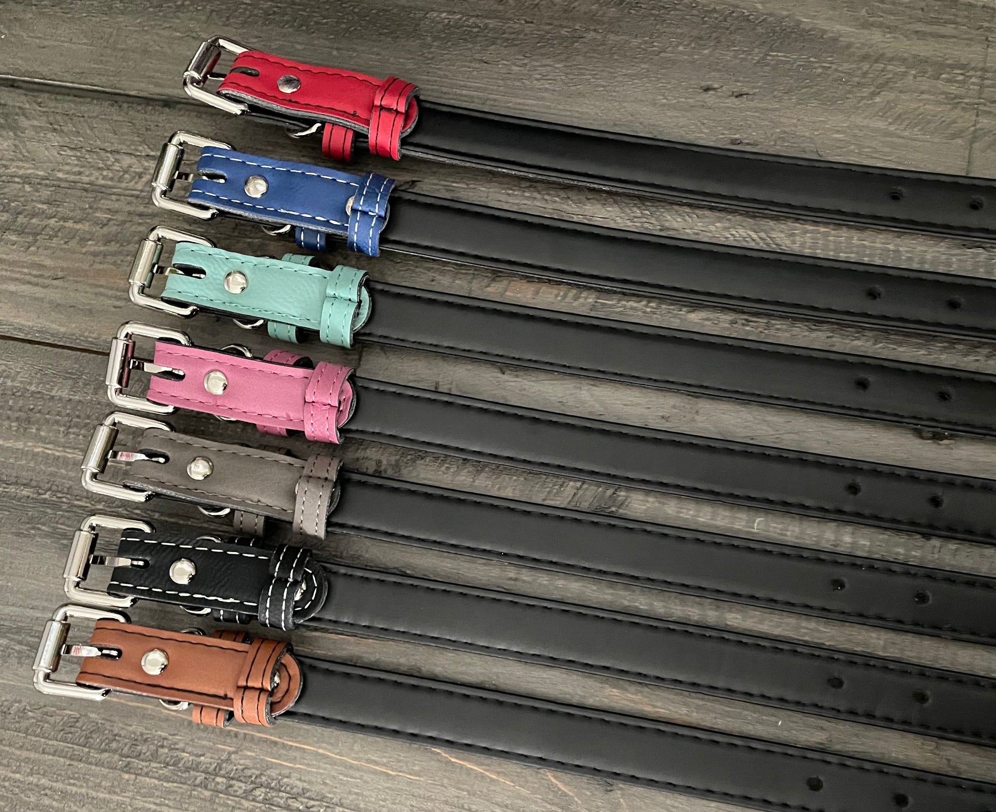 Each collar has a black padded backing.